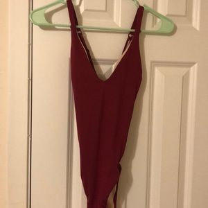 Maroon one piece.